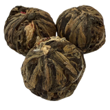 Oolong Mystère Flowering Tea, loose leaf: blossoming, layered and aromatic
