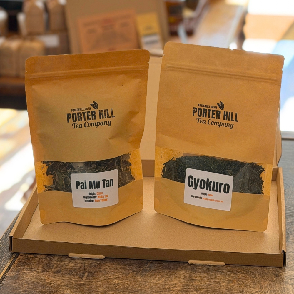 Pai Mu Tan and Gyokuro loose leaf tea pouches in a gift box