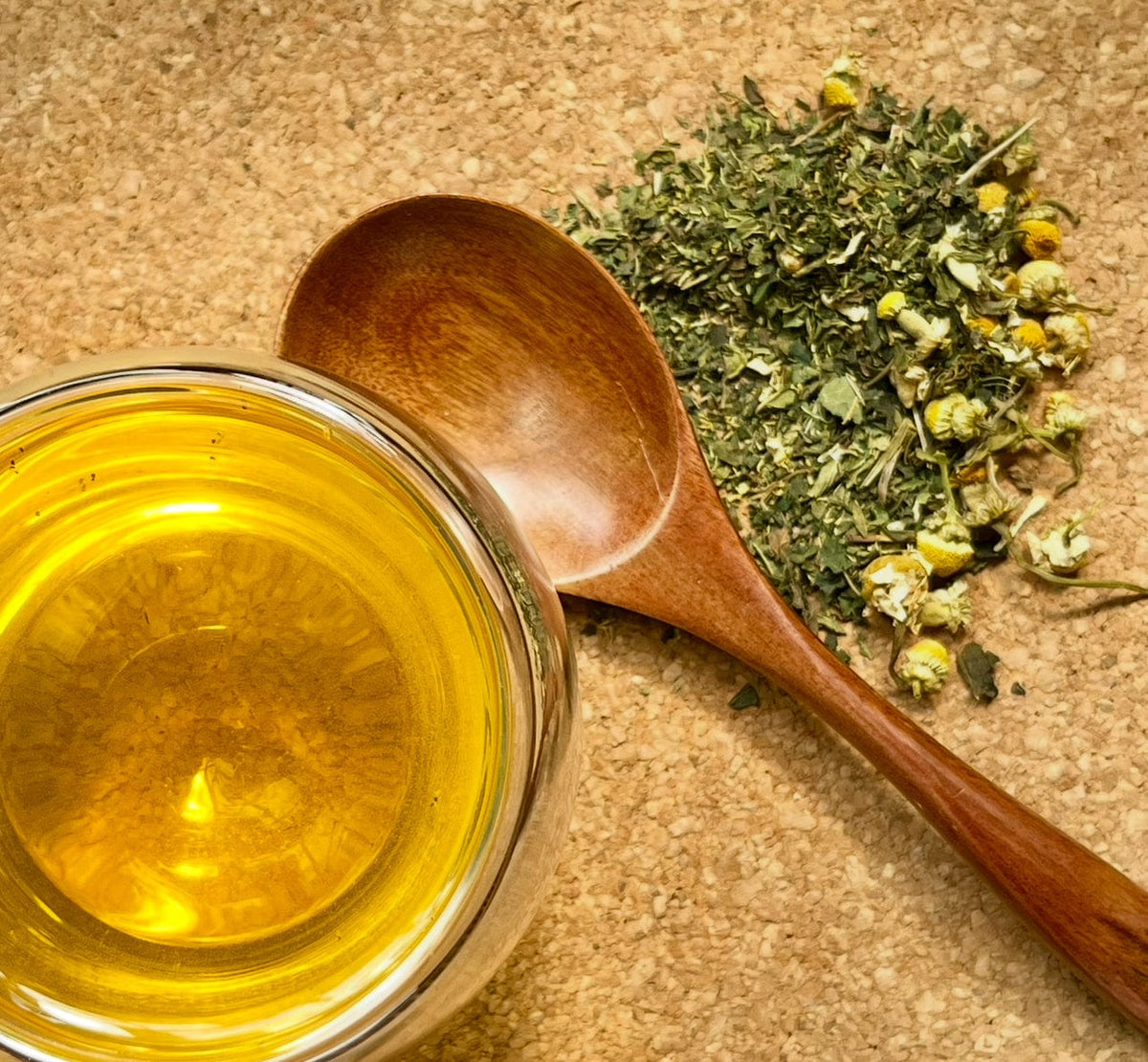 Meadow Morning Walk herbal tea beside its loose ingredients