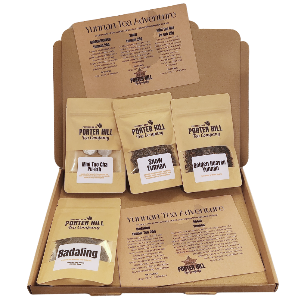 Open Yunnan Tea Adventure gift box with four Chinese loose leaf teas