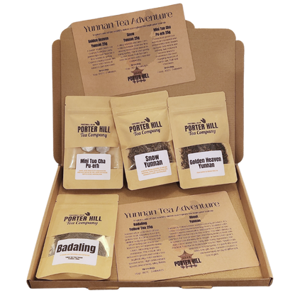 Open Yunnan Tea Adventure gift box with four Chinese loose leaf teas