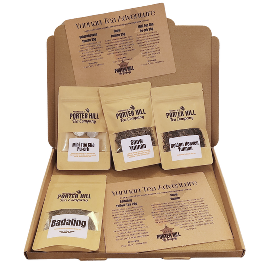 Open Yunnan Tea Adventure gift box with four Chinese loose leaf teas