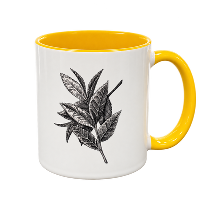 Yellow Porter Hill mug showing the detailed botanical tea leaf illustration by Lauren J. Squires