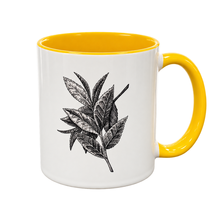 Yellow Porter Hill mug showing the detailed botanical tea leaf illustration by Lauren J. Squires