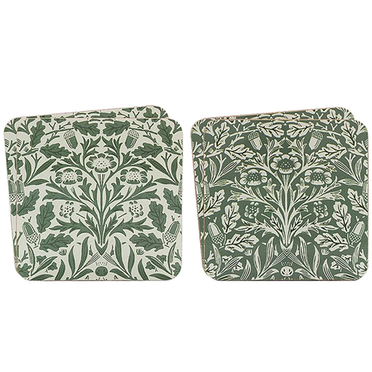 Set of four cork-backed William Morris Acorn coasters on a transparent background