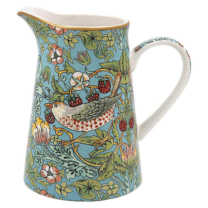 William Morris Strawberry Thief jug with birds, strawberries and green foliage on pale blue