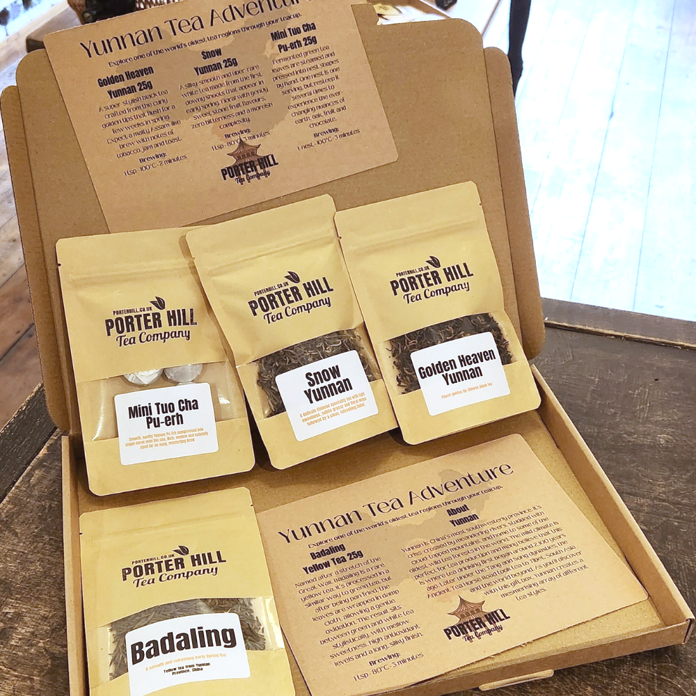 Yunnan loose leaf tea discovery gift box on a wooden table