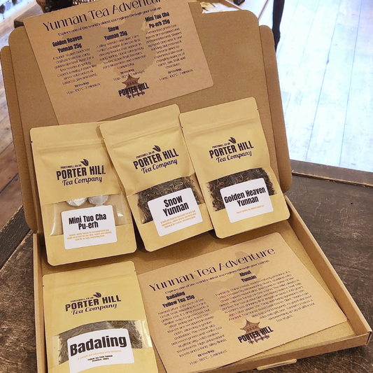 Yunnan loose leaf tea discovery gift box on a wooden table